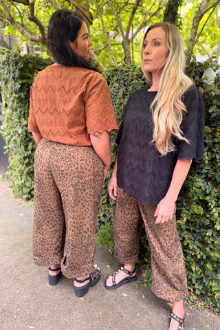 Evana in the Luna Top in Black broderie and Bianca in the Luna Top in Hazelnut broderie, Sahara Barrel Jeans in Panther with deep turn-up cuffs — Libertine The Label