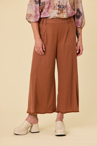 Voyager wide-leg pants in hazelnut stretch fabric with blanket stitch hem | Libertine The Label
