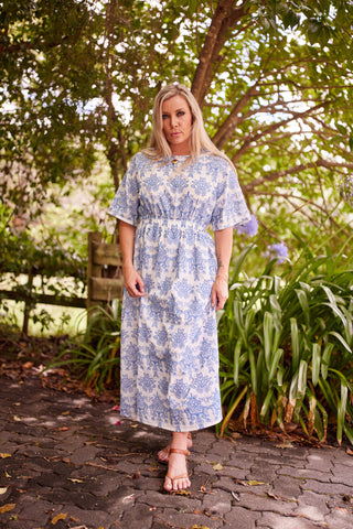 Evana, NZ size 12, wearing the Devotion Dress in Cornflower embroidery — Libertine The Label