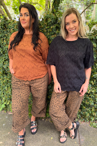 Evana in the Luna Top in Black broderie and Bianca in the Luna Top in Hazelnut broderie, both wearing the Sahara Barrel Jeans in Panther — Libertine The Label