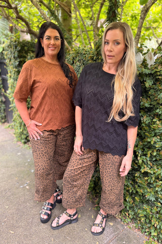Bianca in the Luna Top in Hazelnut broderie with Evana in the Luna Top in Black broderie, both in the Sahara Barrel Jeans in Panther — Libertine The Label