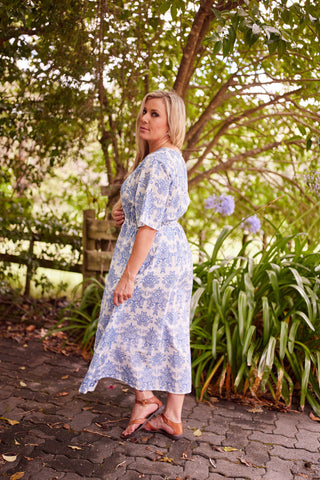 Devotion Dress in Cornflower embroidery on Evana, NZ size 12, showing the empire line and full skirt — Libertine The Label