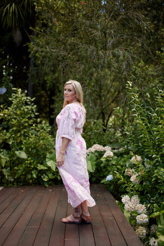 Evana in the Devotion Dress in Marshmallow pink ramie with peony embroidery and gently elasticated empire waist — Libertine The Label