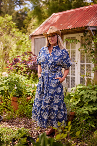 Holiday Dress in indigo embroidery, front view with tie waist — Libertine The Label