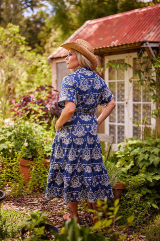 Holiday Dress in indigo embroidery, full-length side view — Libertine The Label