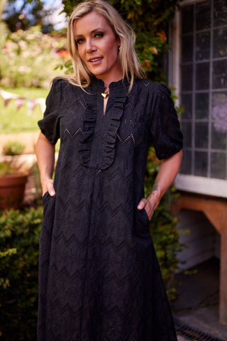 Belle Dress in black broiderie, puff sleeve close-up — Libertine The Label
