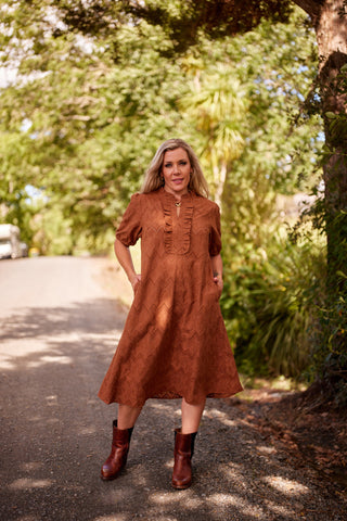 Belle Dress in hazelnut broiderie, front view with puff sleeves — Libertine The Label