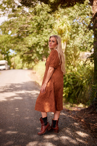 Belle Dress in hazelnut broiderie, side view showing A-line — Libertine The Label
