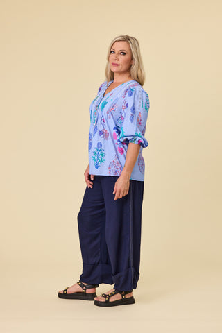 Evana in the Atlas Blouse, Sky botanical print with crochet lace and pintucks — Libertine The Label