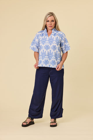 Dylan Blouse in Cornflower embroidery worn by Evana, NZ size 12, showing the below-elbow sleeve — Libertine The Label