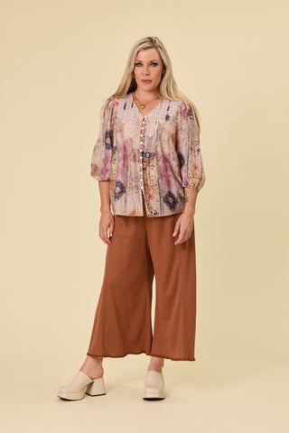 Evana in the Atlas Blouse in Mirage print with the Voyager pants in Hazelnut knit — Libertine The Label
