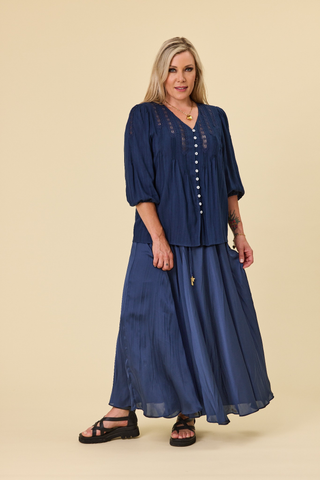 Evana wearing the Atlas Blouse in Indigo Jacquard and the Sway Skirt, full length — Libertine The Label