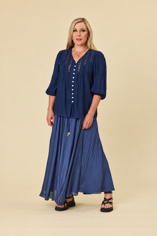 Evana in the Atlas Blouse in Indigo Jacquard with the Sway Skirt in Indigo satin — Libertine The Label