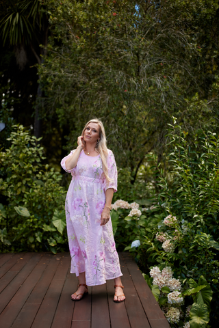 Evana in the Devotion Dress in Marshmallow pink ramie with peony embroidery and empire waist — Libertine The Label