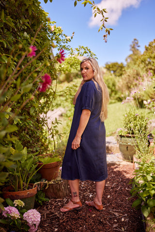 Belle Dress in indigo, close-up of ruffled neckline and white contrast stitching — Libertine The Label