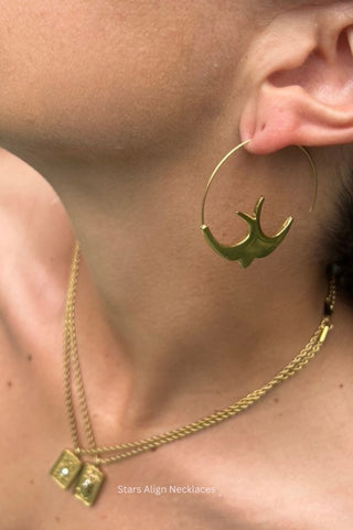 Swallow Hoops in gold close-up