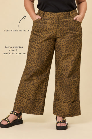 Close front view of the Sahara Barrel Jeans in Panther on Jorja, NZ size 16 in a size L, showing the flat front waistband and deep turn-up cuff — Libertine The Label