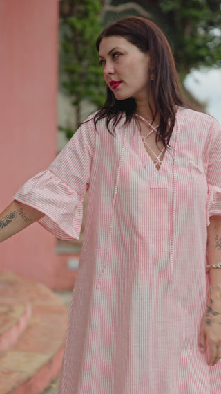 woman in melon and white stripe summer dress